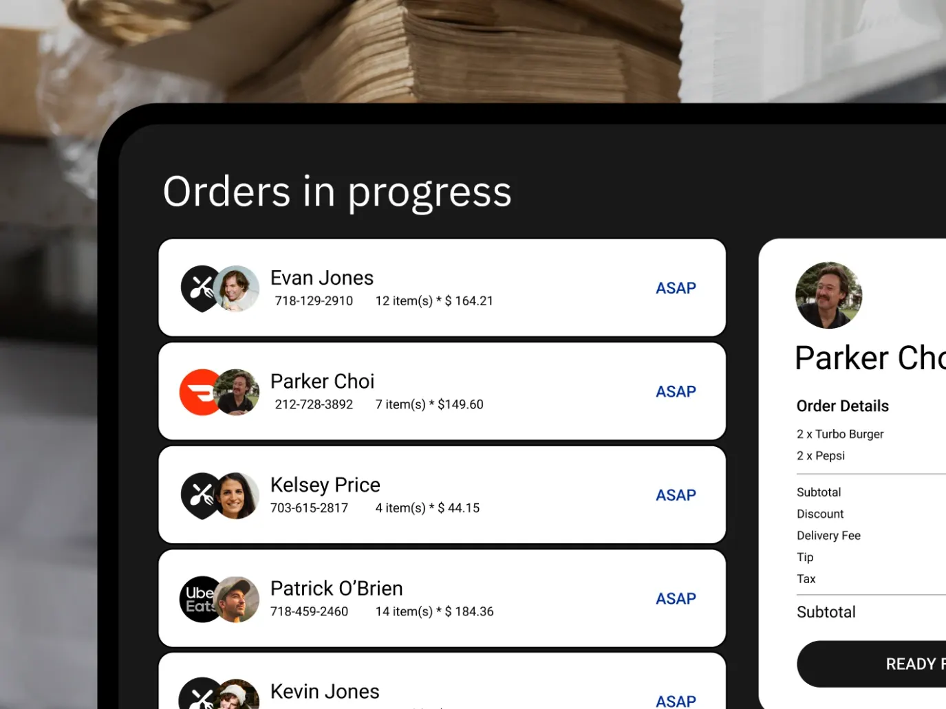 Tablet screen listing orders in progress from several ordering channels